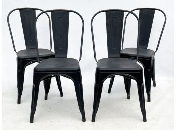 A Set Of 4 Industrial Chic Metal Side Chairs