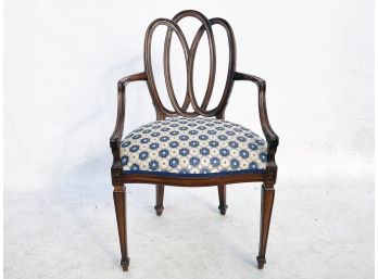 An Antique Mahogany Arm Chair