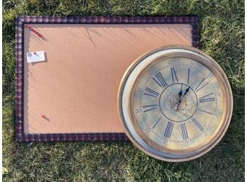 A Clock And A Cork Board