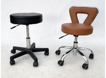 A Pairing Of Leather Stools - Black And White
