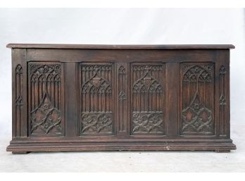 An Early 19th Century Gothic Revival Paneled And Carved Oak Blanket Chest