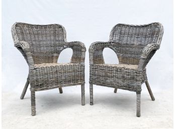 A Pair Of Natural Wicker Arm Chairs