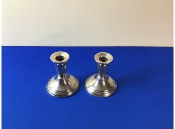 Pair Of Sterling Weighted Candle Stick Holders
