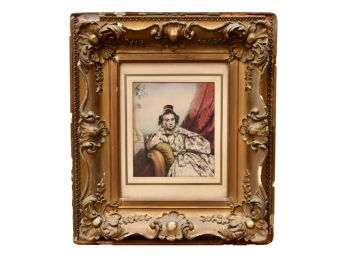 Woman Sitting On A Chaise Lounge Lithograph Framed In An Ornately Carved  Scrolled Floral  Gold Double Frame