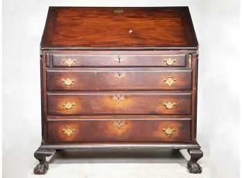 An Antique Mahogany Secretary Desk With Brass Fittings And Ball And Claw Feet