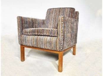 A Vintage Modern Upholstered Accent Chair With Oak Legs