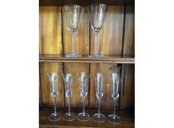 Set Of 5 Champagne Flutes And 2 Wine Glasses, Red And Green Christmas Ribbon Candy Stems