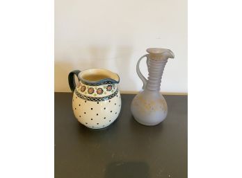A Ceramic Pitcher Made In Poland And Hand Blown Glass Pitcher