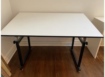 An Adjustable Drafting Table - 60'w X 37.5'd