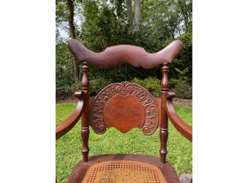 Antique Carved Oak Arm Chair With Caned Seat