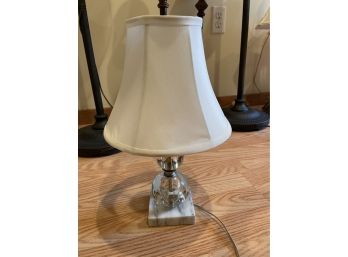 Small Glass Lamp On Marble Slab