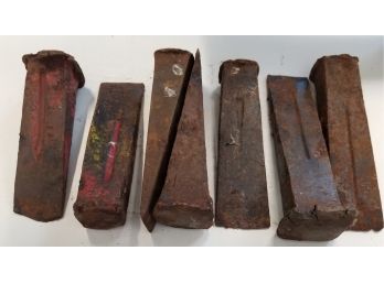 Seven Vintage Cast Iron Wood Splitting Wedges