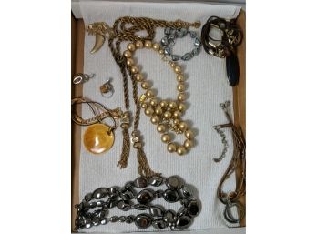 Group Of Gold And Silver Colored Jewelry