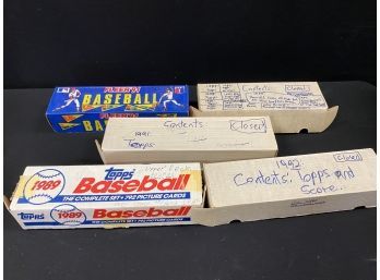 A Collection Of New And Used Baseball Card