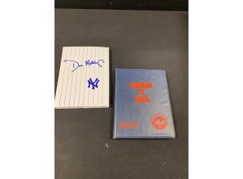 A Collection Of Yankees And Mets Baseball Cards.