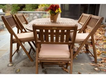 Outdoor Interiors Eucalyptus Oval Table With Six Folding Chairs