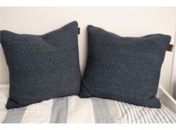 Two UGG Decor Pillows