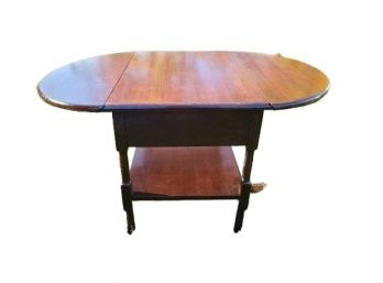 Antique Drop Leaf Coffee Table On Casters