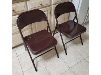 Pair Of Brown Folding Chairs