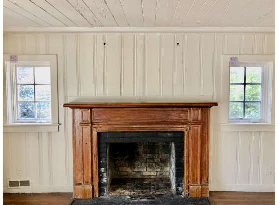 A Pair Of 6 Lite Casement Windows To Left And Right Of Fireplace With Exterior Attached Storms