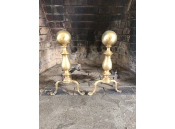 A Pair Of Brass Claw Foot Andirons