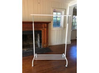 A White Clothes Rack - Adjustable - Wheels