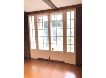 A Pair Of  Wood, 10 Lite French Doors With 10 Sidelights On Each Side