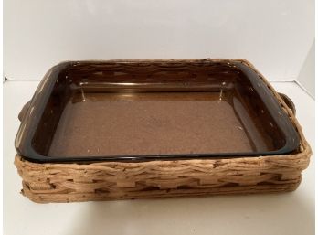 Brown Pyrex Serving Dish In Wicker Carrier