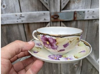Porcelain Floral Motif Tea Cup And Saucer