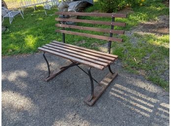 Slatted Wood Bench With A Metal Base