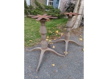 A Pair Of Cast Iron Table Bases
