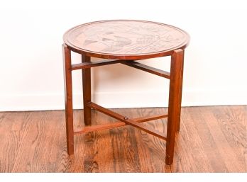 Circular Wooden Accent Table With A Hand-Carved Top
