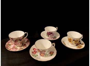 Four Collectible Teacup And Saucer Sets