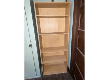 Faux Wood Bookcase With Adjustable Shelves Laminated Over Particle Board