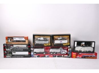 Assorted Collection Of 8 Tractor Trailer Replicas