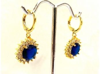 Stunning Gold Tone And Sapphire-colored Stone With Cubic Zircon Halo