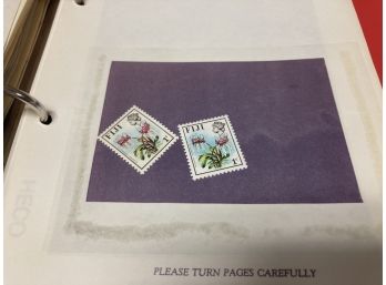 Collection Of A Hundred East African And Other Foreign Stamps In A Book