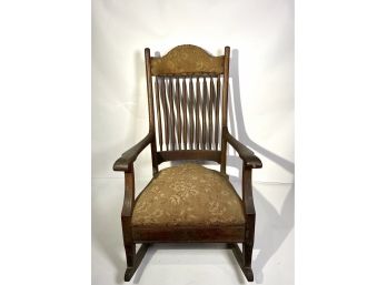 Antique Tapestry Nailhead Detail Upholstered Seat And Headrest Spindle Back Rocking Chair