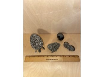Three Pyrite Pieces And A Black Stone (Onyx?) Nice Heavy Pyrite