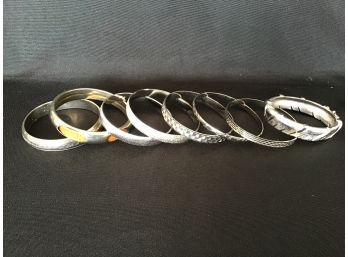 Lot Of 8 Silver Toned Bangles