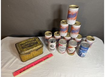 Sensation Smoking Tobacco Tin, 11 Beer Cans And 1 Can Winter Olympic Snow Containing A Packet Of Snow.