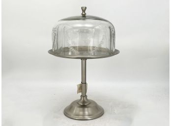 A Glass And Chrome Cake Stand
