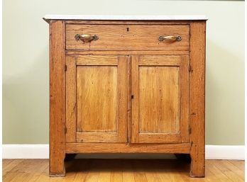 A Gorgeous Mid-19th Century Paneled Oak Marble Top Cabinet