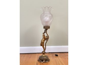 An Antique Bronze Figural Lamp