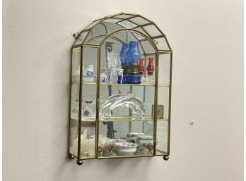 A Brass And Glass Shelf And Miniature Collection