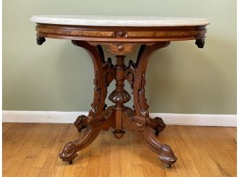 A 19th Century Carved Mahogany Occasional Table With Marble Top In Empire Style
