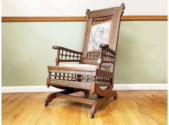 A Gorgeous Carved Oak Stick And Ball Victorian Rocking Chair