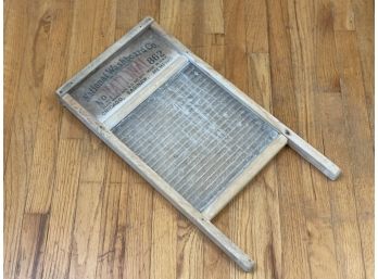 An Antique Glass Washboard