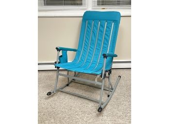 A Pairing Of Rocking Folding Chairs