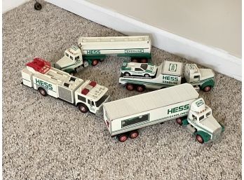 A Group Of Vintage Hess Trucks